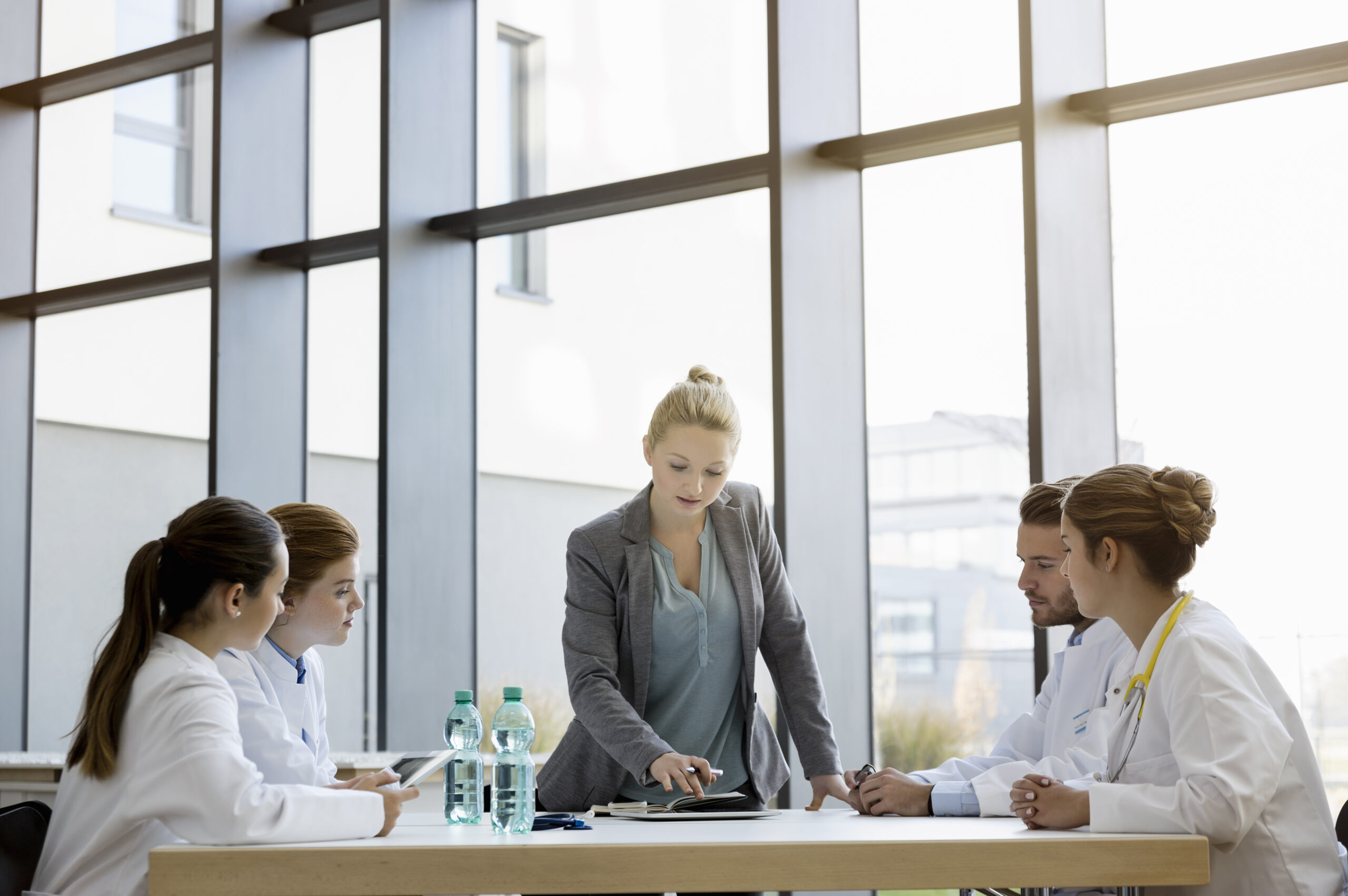 Group of doctors in meeting with consultant